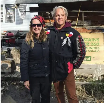 Sacha Gendron with Drew Hayden Taylor at an outdoor event